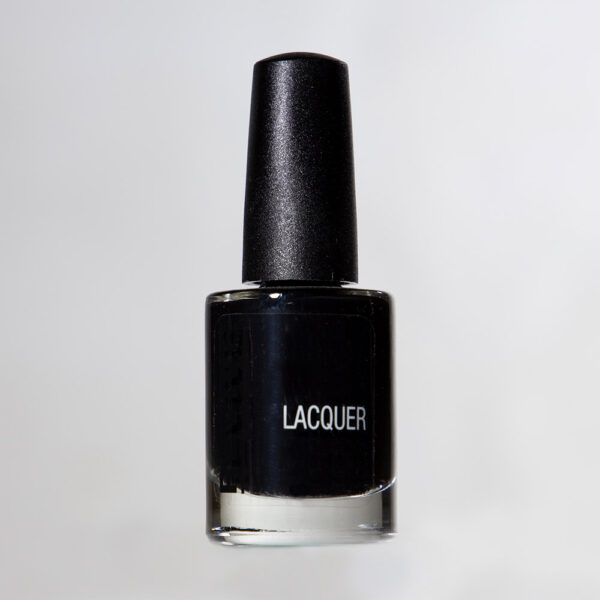 Bottle Of Black Nail Polish With "Lacquer" Label, Isolated On White Background.