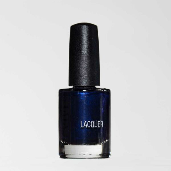 A Bottle Of Dark Blue Lacquer Nail Polish With A Black Cap, A Beauty Product.