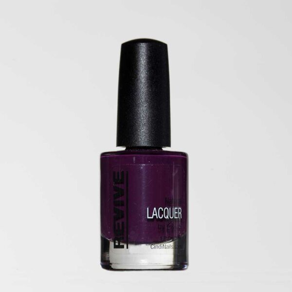 A Bottle Of Revive Natural Lacquer Nail Polish In A Deep Purple Color With A Black Cap.