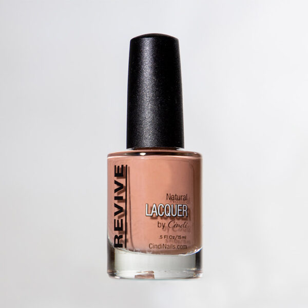 Product Shot Of A Revive Nail Lacquer Bottle In A Neutral Beige Color. Labels Read "Natural Lacquer By Cindi".