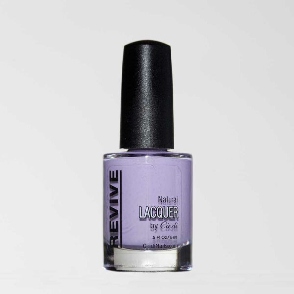A Bottle Of Revive Natural Lacquer Nail Polish In A Soft Lavender Color.