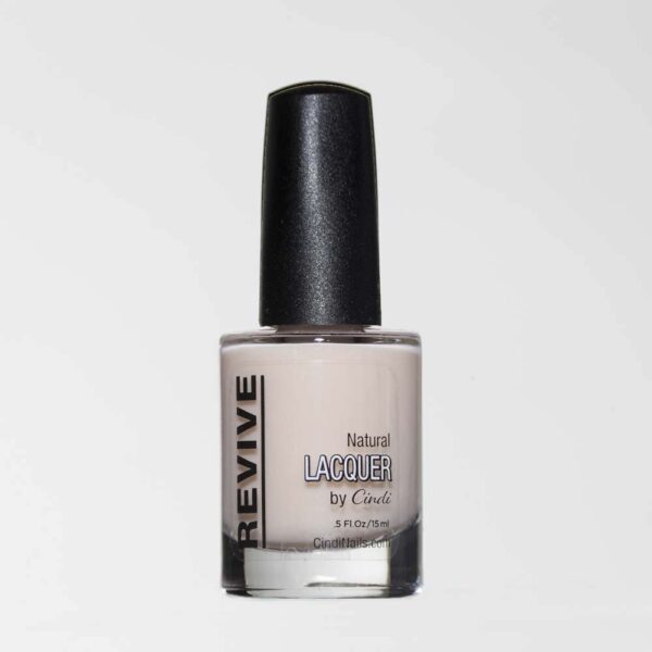 A Single Bottle Of Revive Natural Lacquer Nail Polish In A Light Beige Color With A Black Cap Against A White Background.