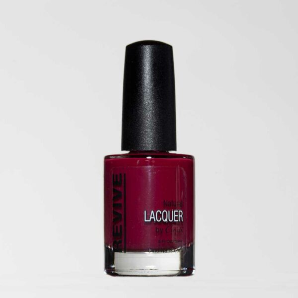 A Bottle Of Deep Red Revive Natural Lacquer Nail Polish, With A Black Cap, Against A White Background.