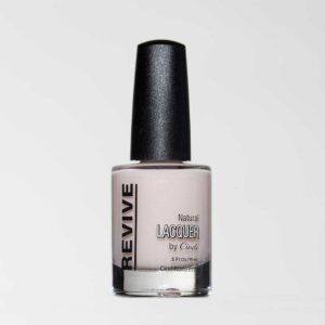 Nail Polish Bottle Of A Light Pink Shade With A Black Cap. The Brand Is "Revive" And "Natural Lacquer By Cindi."