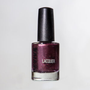 Close-up Of A Bottle Of "Revive" Brand Nail Lacquer, Featuring A Dark Purple Color With A Shimmering Effect.