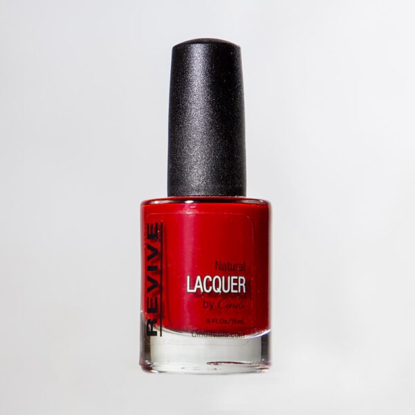 A Bottle Of Red "Revive" Natural Lacquer Nail Polish With A Black Cap, Isolated On White.