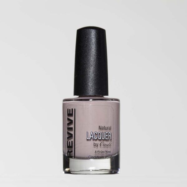 A Bottle Of Revive Nail Lacquer In A Neutral Mauve Shade.