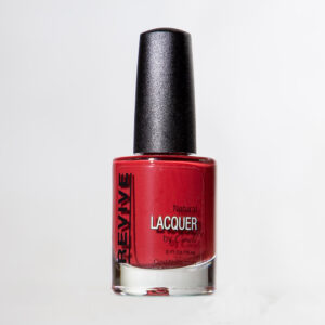 A Bottle Of Red "Revive" Natural Lacquer Nail Polish With A Black Cap, Against A White Background.