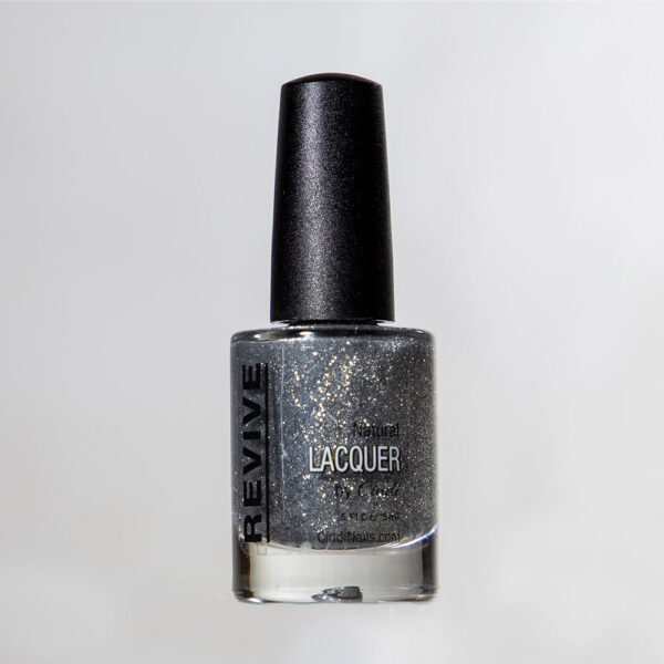 Close-up Of A Revive Natural Lacquer Nail Polish Bottle In A Gray, Shimmering Shade.