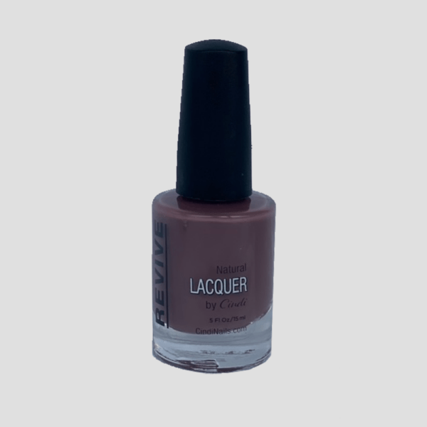 Nail Polish Bottle With "Revive" Label, Featuring A Dark Purplish-brown Lacquer.